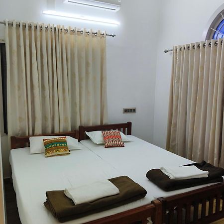 Tess Holistay Fort Kochi Номер фото