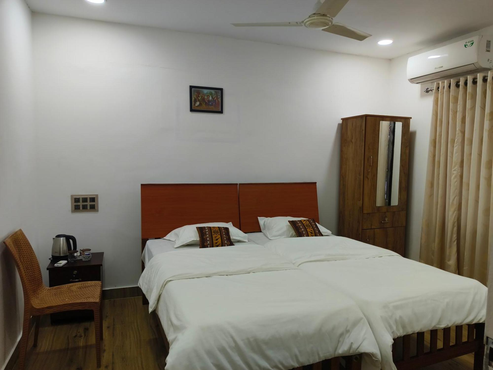 Tess Holistay Fort Kochi Номер фото
